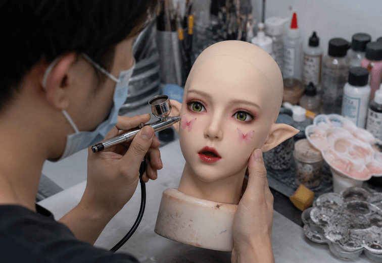 Hand painting a custom character silicone doll